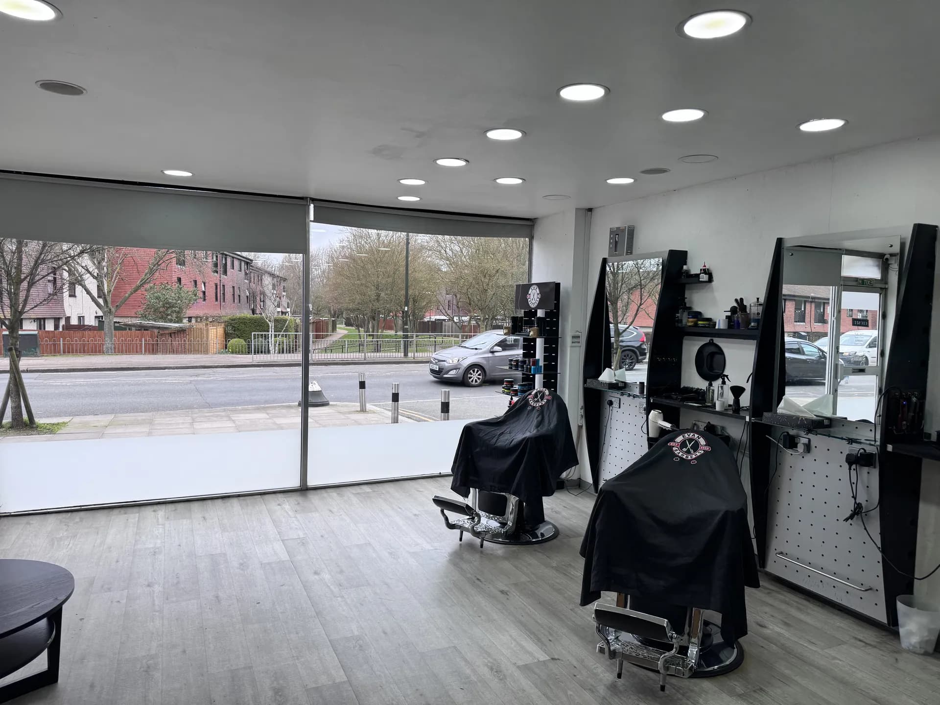 Inside Evan Barbers Grand Drive — barber chairs and modern interior