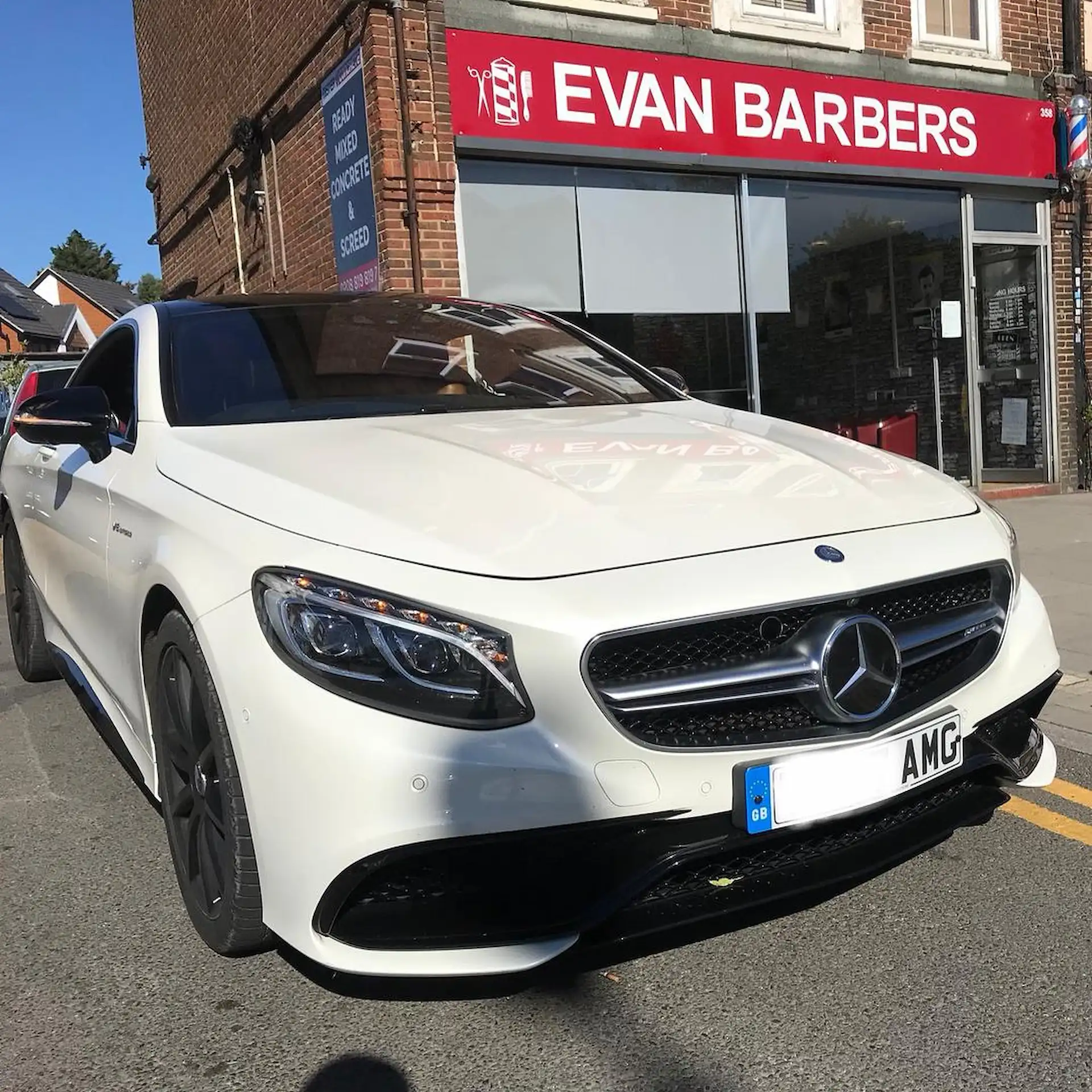 Barber tools and a modern setting representing Evan Barbers' mission